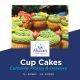 Vibrant holiday cupcakes from 7th Heaven Swiss Bakery featuring playful green buttercream swirls, festive sprinkles, and whimsical red decorations. The professional styling showcases both precision and seasonal joy.